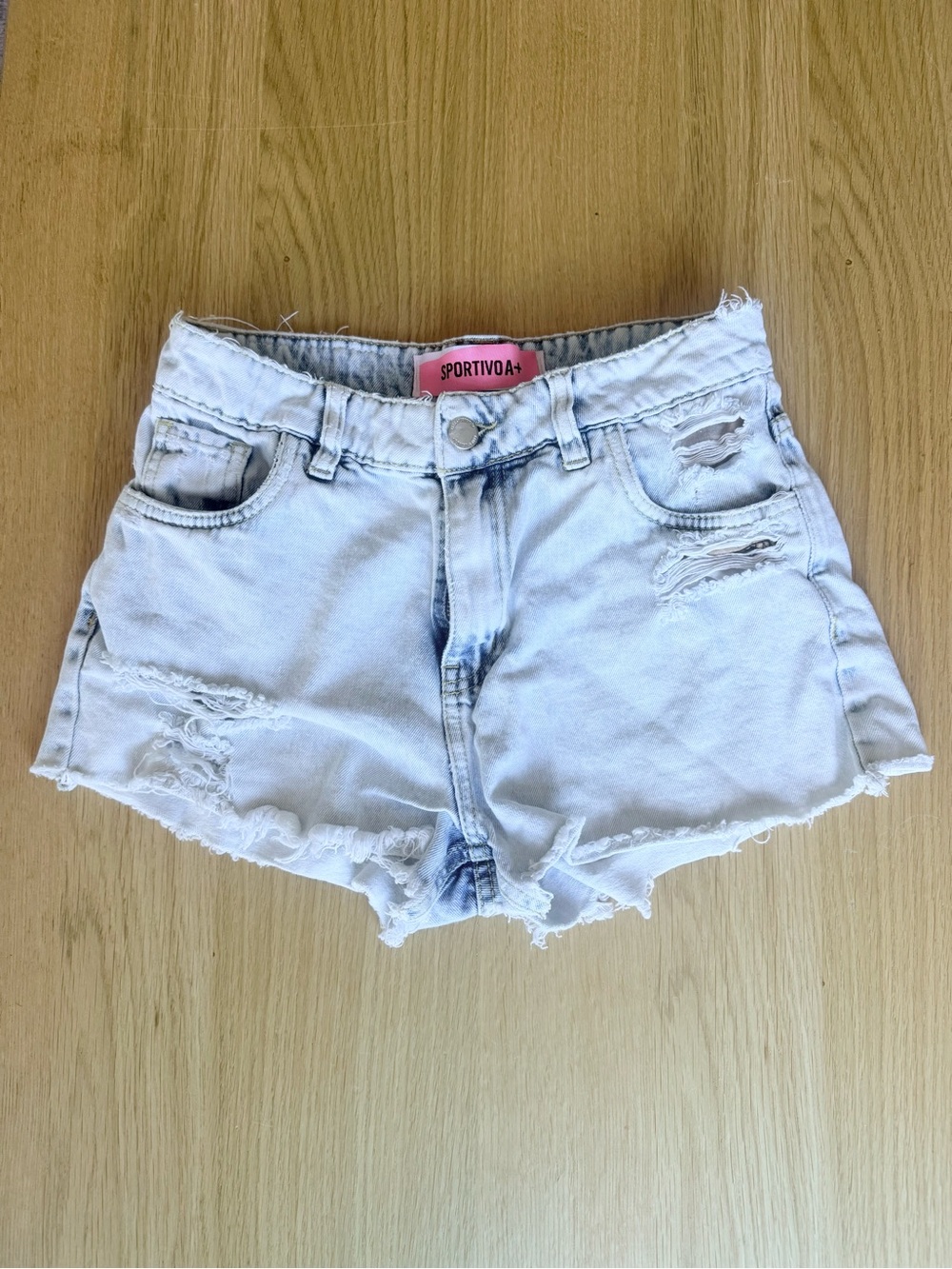 Light Wash Distressed Women’s Denim Shorts from Argentina